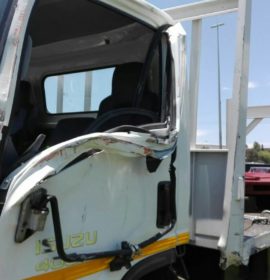 Stationary bakkie rear-ended by a truck on the R24 East after Edenvale