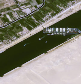 This satellite image from Cnes2021, Distribution Airbus DS, shows the cargo ship MV Ever Given stuck in the Suez Canal near Suez, Egypt, Thursday, March 25, 2021. The skyscraper-sized cargo ship wedged across Egypt's Suez Canal further imperiled global shipping Thursday as at least 150 other vessels needing to pass through the crucial waterway idled waiting for the obstruction to clear, authorities said. (Cnes2021, Distribution Airbus DS via AP)
