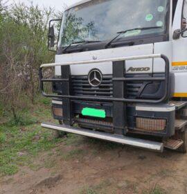 Two illegal miners caught in the act by police and private security during a disruptive operation in Burgersfort