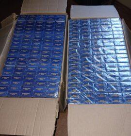 Suspect arrested by police for possession and transportation of illicit cigarettes