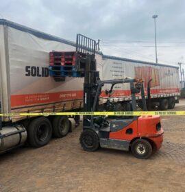Suspects found in possession of a reported hijacked truck and stolen goods