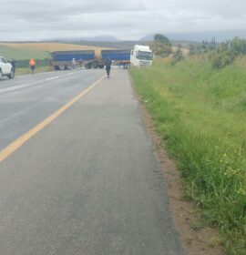 Truck making a U-Turn blocks traffic at the Goukou Bridge on the N2